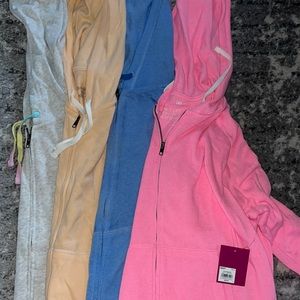 4 - XL lounge sweatshirt Zip-ups. All new with tags. Listing as a bundle.
